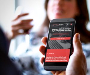 Mobile phone screen displaying search results for Mr. BusinessBuilder, a web design and SEO services provider in Helena, MT, highlighting mobile-friendly website design and local SEO success.